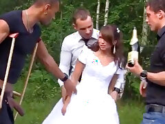 A redhead Russian wife gets tattooed and gangbanged outdoors